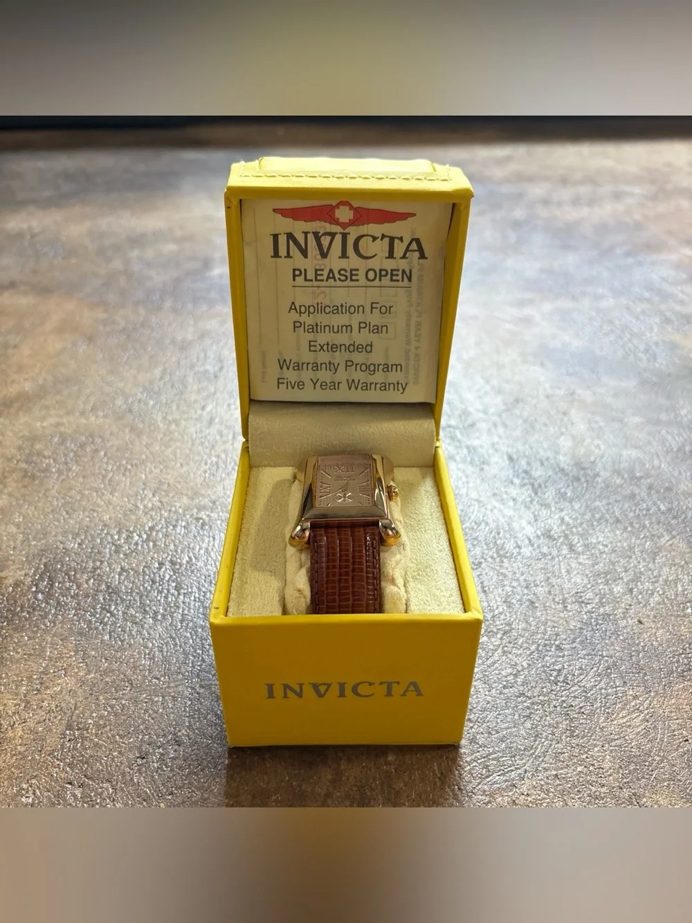 Invicta 11801 men's watch with brown leather strap